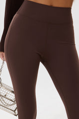 DRIVE ME CRAZY STIRRUP LEGGING IN BROWN