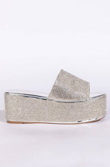 AND ANOTHER ONE SLIP ON FLATFORM SANDAL