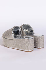 AND ANOTHER ONE SLIP ON FLATFORM SANDAL