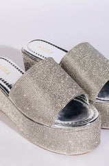 AND ANOTHER ONE SLIP ON FLATFORM SANDAL